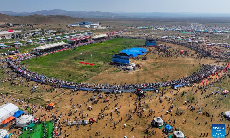 An aerial drone photo taken on July 14, 2024 shows the opening ceremony of the 34th Naadam festival in Xilin Gol League, north China's Inner Mongolia Autonomous Region.