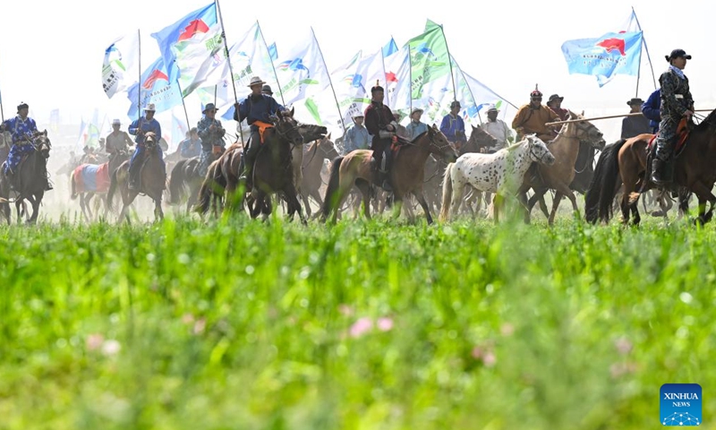 Herders on horseback are pictured during the opening ceremony of the 34th Naadam festival in Xilin Gol League, north China's Inner Mongolia Autonomous Region, July 14, 2024.