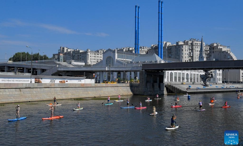 People take part in a fancy dressed SUP(Stand Up Paddle) surfing festival in Moscow, Russia, on July 14, 2024. (Photo: Xinhua)