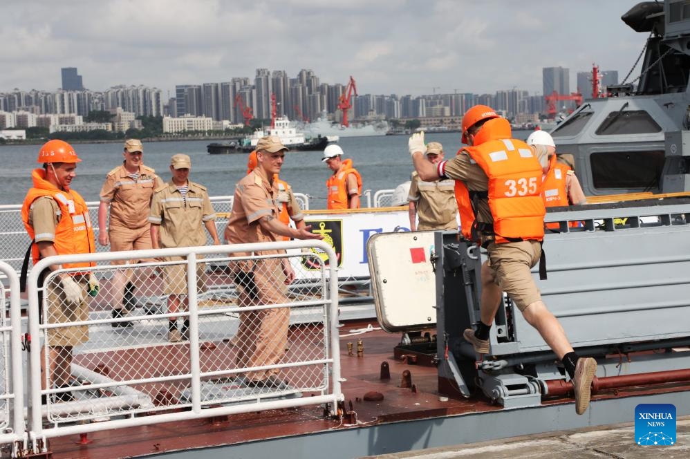 Crew members of the Russian corvette Gromkiy are seen at a naval port in Zhanjiang, south China's Guangdong Province, July 15, 2024. Chinese and Russian fleets set sail from a naval port in Zhanjiang, south China's Guangdong Province, on Monday for a three-day maritime exercise. (Photo: Xinhua)