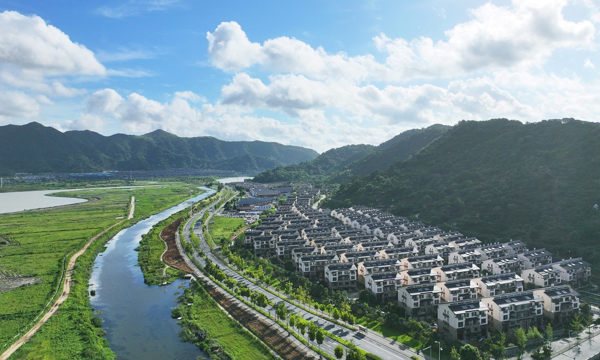 Residential buildings stand orderly under a blue sky in Taizhou, East China's Zhejiang Province, on July 16, 2024. Photo: VCG