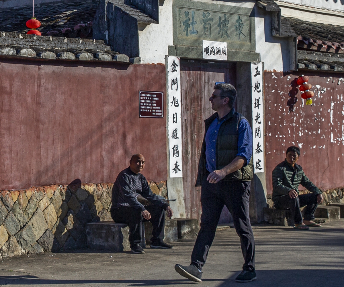Harvard University professor Michael Szonyi (center) wanders through a village in Yongtai county, Fujian Province. Photo: Courtesy of Michael Szonyi