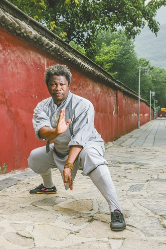 Selay Marius Kouassi, a participant from Cote d'Ivoire and also a martial arts coach, showcases his Shaolin kung fu inside the Shaolin Temple in Dengfeng county, Central China's Henan Province on July 13, 2024. Photo: Li Hao/GT.