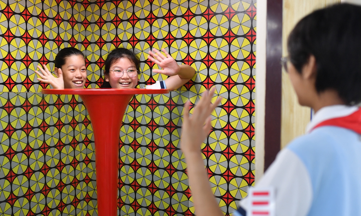 Elementary school students experience an