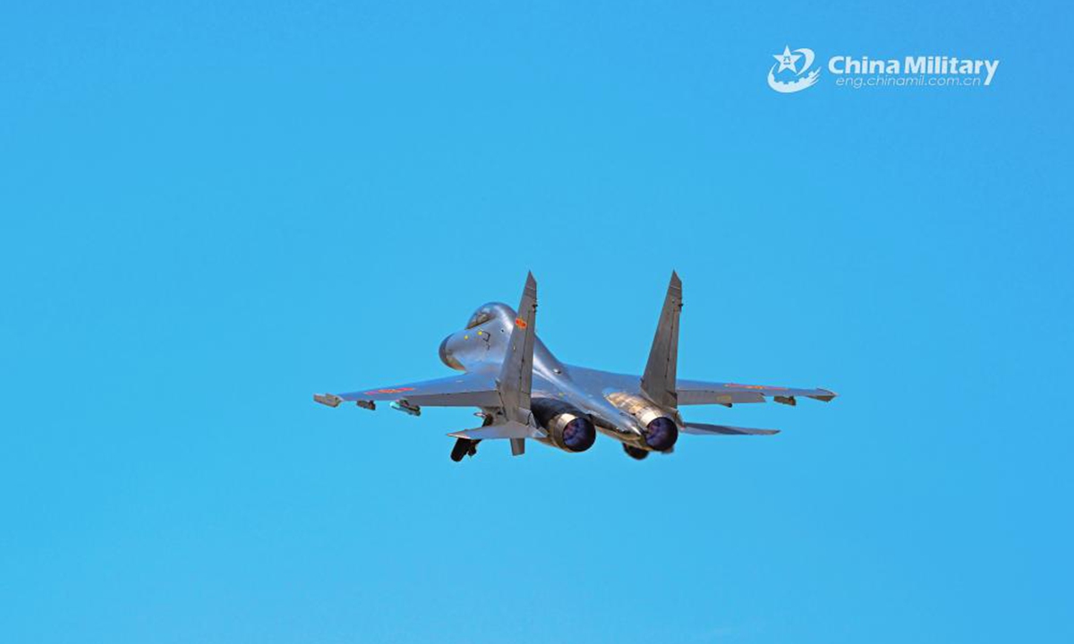 A fighter jet attached to an aviation regiment under the PLA Air Force soars into the sky during a flight training exercise in early June, 2024. (eng.chinamil.com.cn/Photo by He Wanli)