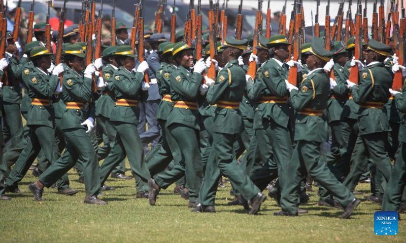 Members of the Defense Forces march on a parade during a celebration for the Defense Forces Day in Harare, Zimbabwe, on Aug. 13, 2024. Zimbabweans on Tuesday commemorated the 44th anniversary of the Defense Forces Day, observed every second week of August, to honor members of the uniformed forces for their duty in protecting the country. (Photo: Xinhua)