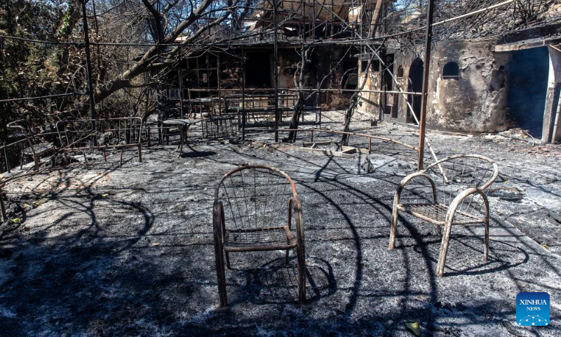 This photo shows a restaurant damaged by wildfire in northern Athens, Greece, on Aug. 13, 2024. (Photo: Xinhua)