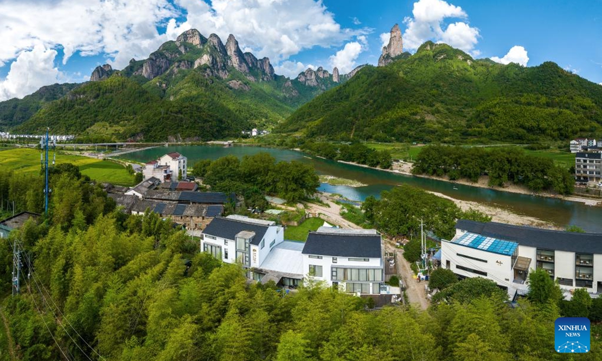 This photo shows surroundings of homestay business in Danzhu Town in Xianju County, east China's Zhejiang Province, July 28, 2024.
Xianju County is rich in tourism resources. By tapping local characteristic cultural resources and introducing high-end boutique homestay projects, the local government has turned resource advantages into industrial advantages, igniting a new engine for rural revitalization.  (Photo: Xinhua)