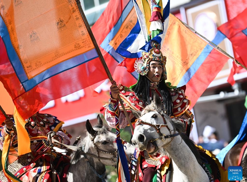 Artists perform on horseback during a celebration in Maqen County, the Tibetan Autonomous Prefecture of Golog, northwest China's Qinghai Province, Aug. 3, 2024. The Tibetan Autonomous Prefecture of Golog saw a variety of activities organized on Saturday in celebration of the 70th anniversary of its establishment. Photo: Xinhua