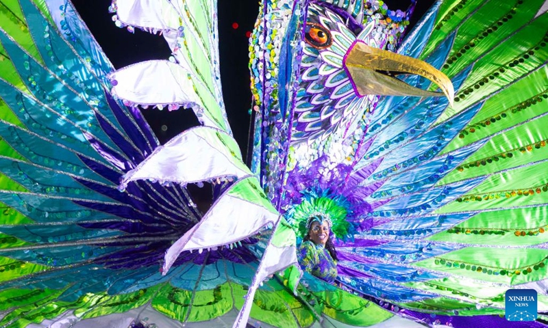 A dressed-up competitor performs during the King and Queen Showcase of the 2024 Toronto Caribbean Carnival in Toronto, Canada, Aug. 1, 2024. Dozens of masqueraders competed for the King and Queen of the Carnival here on Thursday. Photo: Xinhua