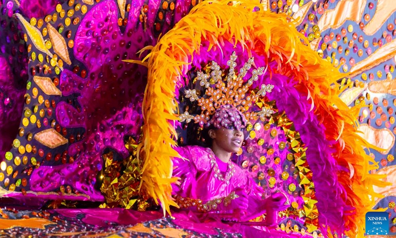 A dressed-up competitor performs during the King and Queen Showcase of the 2024 Toronto Caribbean Carnival in Toronto, Canada, Aug. 1, 2024. Dozens of masqueraders competed for the King and Queen of the Carnival here on Thursday. Photo: Xinhua