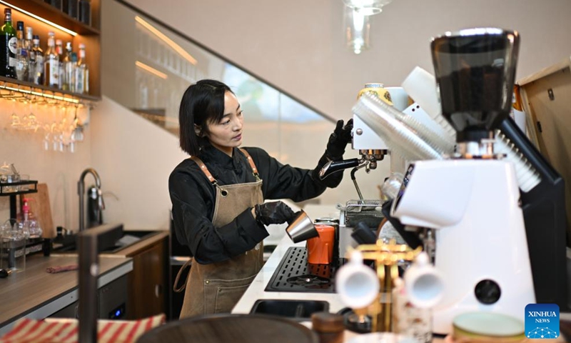 Yeshe Lhamo works at her cafe in Maqen County, the Tibetan Autonomous Prefecture of Golog, northwest China's Qinghai Province, July 30, 2024. Photo: Xinhua