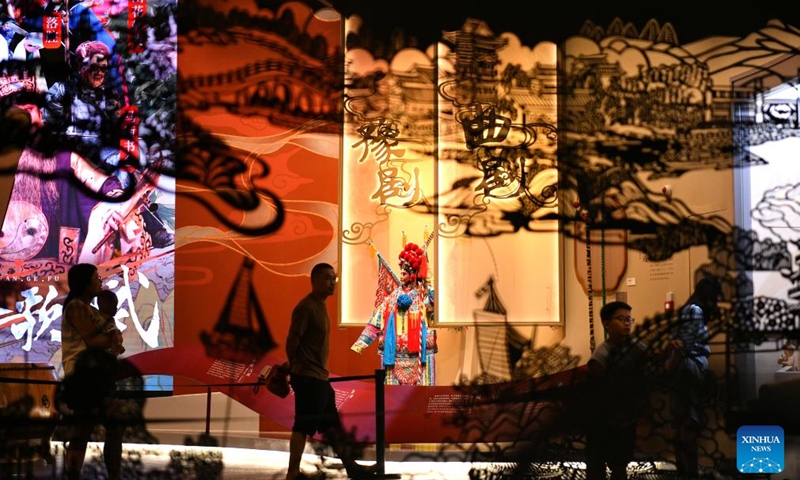 People visit China Grand Canal Intangible Cultural Heritage Exhibition Hall in Cangzhou, north China's Hebei Province, Aug. 2, 2024. With a total construction area of 31,000 square meters and a total exhibition area of 15,885 square meters, China Grand Canal Intangible Cultural Heritage Exhibition Hall showcases the essence of the intangible cultural heritage of eight provinces and municipalities alongside the Grand Canal, making it a popular place among citizens and visitors. Photo: Xinhua