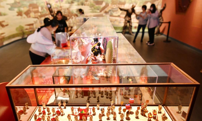 People visit China Grand Canal Intangible Cultural Heritage Exhibition Hall in Cangzhou, north China's Hebei Province, Aug. 2, 2024. With a total construction area of 31,000 square meters and a total exhibition area of 15,885 square meters, China Grand Canal Intangible Cultural Heritage Exhibition Hall showcases the essence of the intangible cultural heritage of eight provinces and municipalities alongside the Grand Canal, making it a popular place among citizens and visitors. Photo: Xinhua