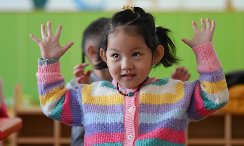 A kid does finger exercises at a kindergarten in the Tibetan Autonomous Prefecture of Golog, northwest China's Qinghai Province, Sept. 4, 2023. Photo: Xinhua
