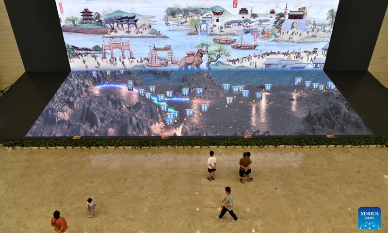People visit China Grand Canal Intangible Cultural Heritage Exhibition Hall in Cangzhou, north China's Hebei Province, Aug. 2, 2024. With a total construction area of 31,000 square meters and a total exhibition area of 15,885 square meters, China Grand Canal Intangible Cultural Heritage Exhibition Hall showcases the essence of the intangible cultural heritage of eight provinces and municipalities alongside the Grand Canal, making it a popular place among citizens and visitors. Photo: Xinhua