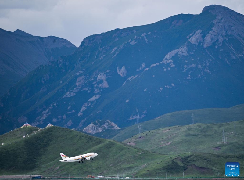 A plane takes off from an airport in the Tibetan Autonomous Prefecture of Golog, northwest China's Qinghai Province, Aug. 3, 2024. Photo: Xinhua