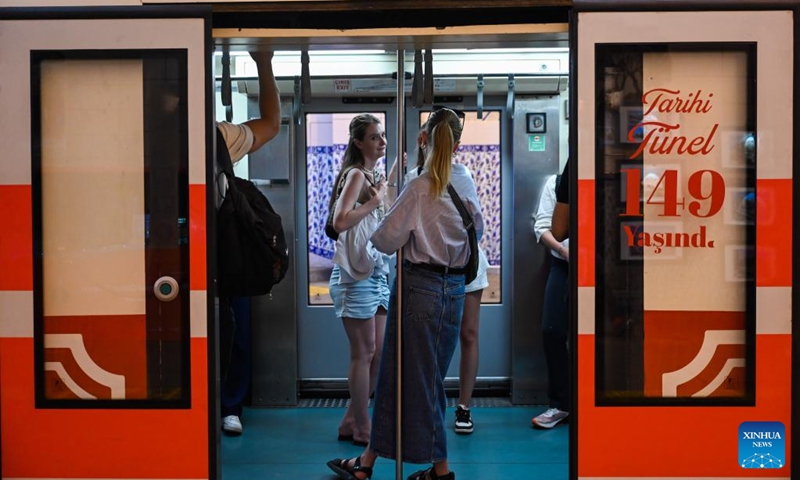 Passengers take the train of the subway line Tünel in Istanbul, Türkiye, July 31, 2024. In 1875, the subway line with two wooden cars, powered by a steam engine, went into operation. The carriages were illuminated by oil lamps as there was no electricity at the time. The line is the second oldest in the world after the one built in 1863 in London.It covers a distance of 573 meters in 90 seconds. Photo: Xinhua