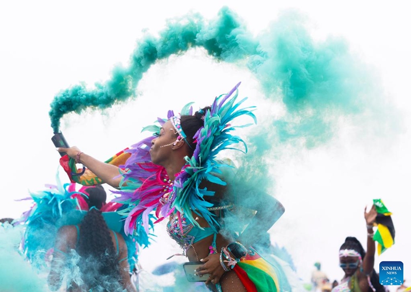 Dressed-up revelers take part in the Grand Parade of the 2024 Toronto Caribbean Carnival in Toronto, Canada, Aug. 3, 2024. The annual event was held here on Saturday to showcase Caribbean culture. Photo: Xinhua