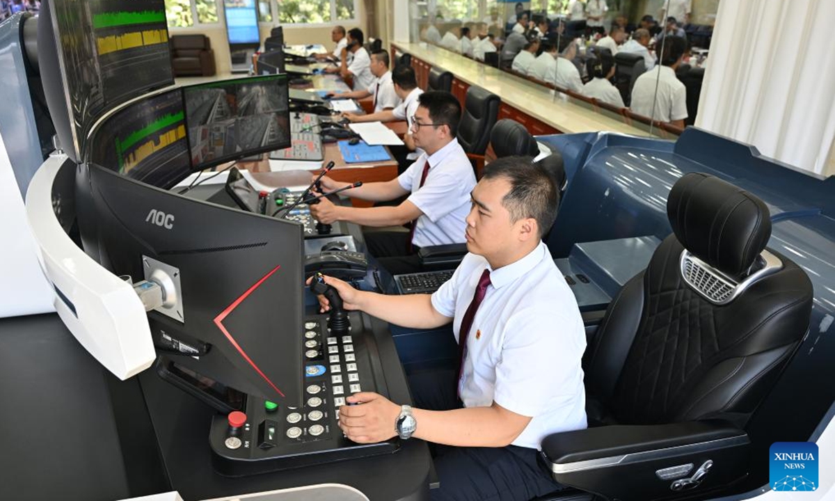 Staff members work at the production dispatch center of the Huayang No. 2 Coal Mine in Yangquan City, north China's Shanxi Province, Aug. 1, 2024. (Photo: Xinhua)