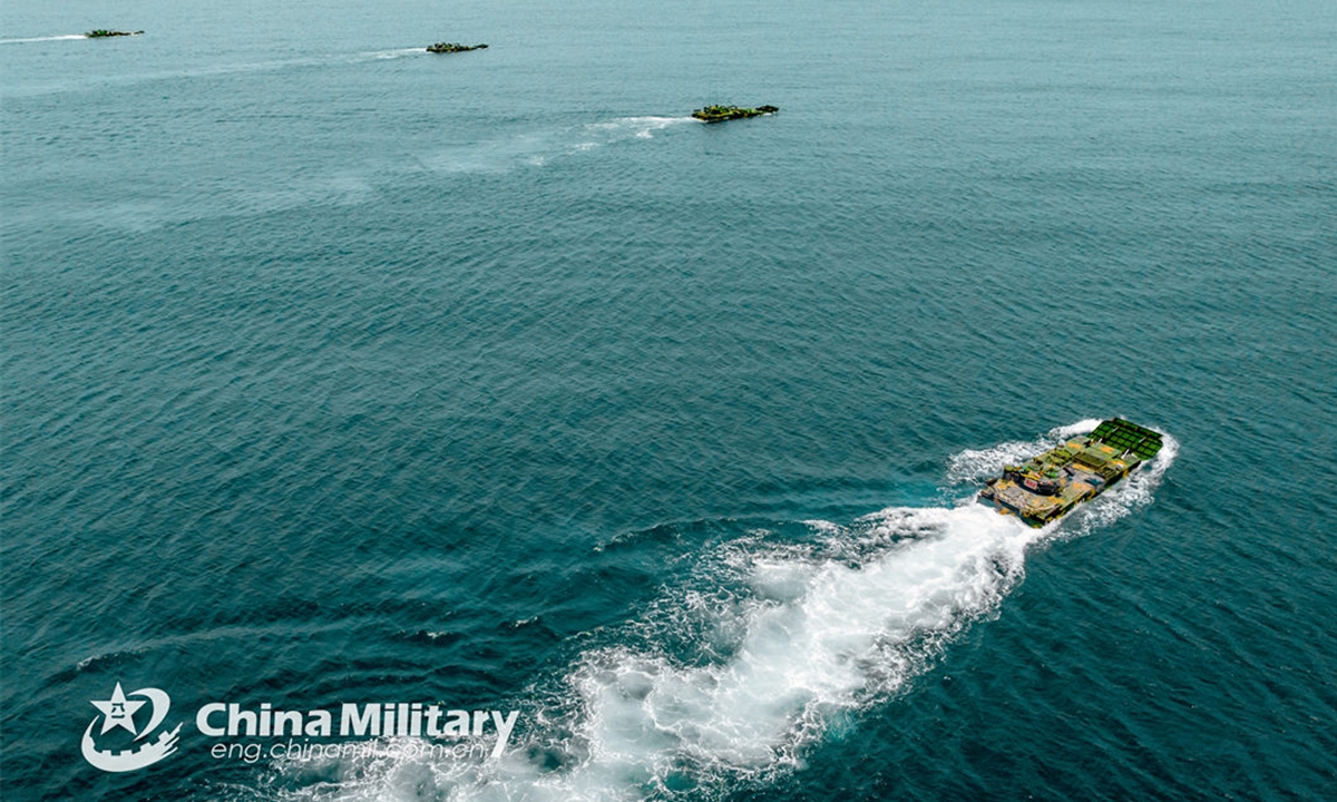 Amphibious armored infantry fighting vehicles (IFVs) attached to a brigade with the army under the PLA Eastern Theater Command maneuver in ferrying and assault wave formation during a tactical training exercise on June 19, 2024. (Photo: China Military Online)