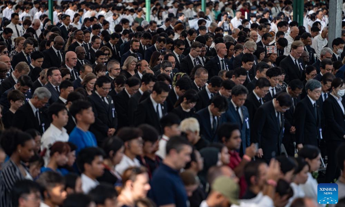Participants mourn atomic bombing victims during a memorial ceremony on the 79th anniversary of atomic bombing in Hiroshima, Japan, Aug. 6, 2024. As Japan marked the anniversary of atomic bombing on the western city of Hiroshima on Tuesday, people from across the nation gathered to protest the government's accelerated arms build-up, urging it to stick to peace. (Photo: Xinhua)