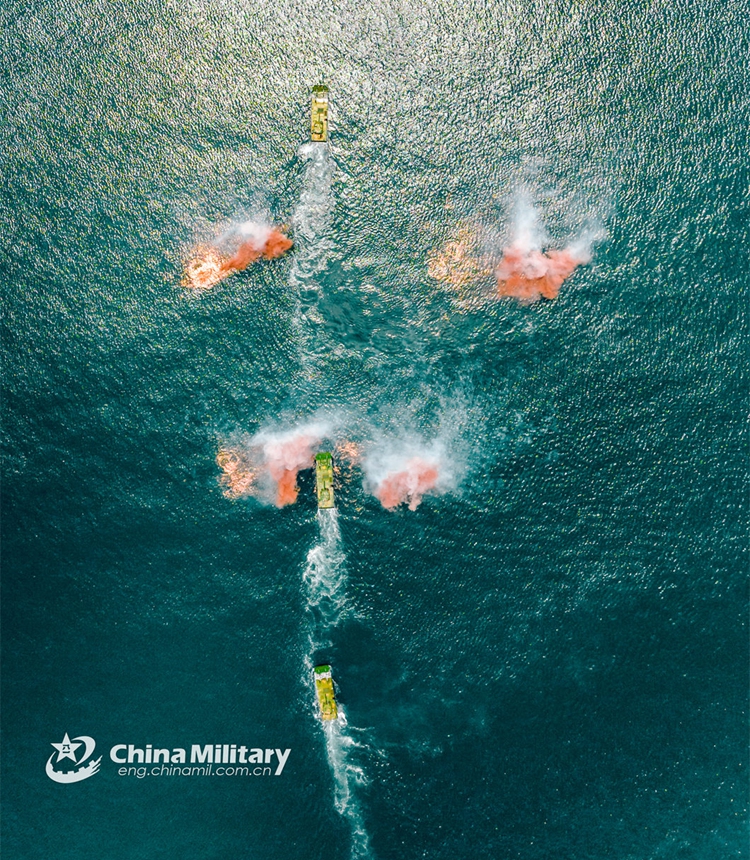 Amphibious armored infantry fighting vehicles (IFVs) attached to a brigade with the army under the PLA Eastern Theater Command maneuver in ferrying and assault wave formation during a tactical training exercise on June 19, 2024. (Photo: China Military Online)