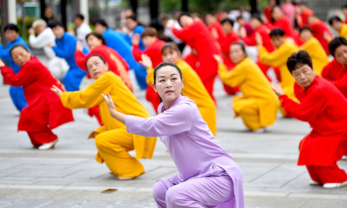 Fitness enthusiasts practice wuqinxi, an ancient Chinese physical exercise mimicking the movements of five animals, at a qigong event in Bozhou, East China's Anhui Province, on August 7, 2023, a day before China's National Fitness Day. Photo: VCG