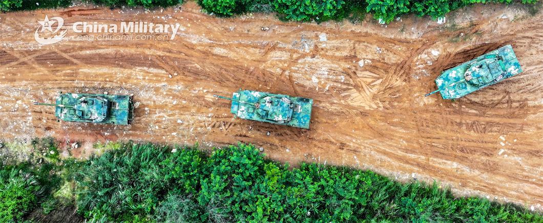 An infantry fighting vehicle (IFV) attached to a brigade under the PLA 73rd Group Army fires at simulated targets during a real-combat training exercise on June 26, 2024. (Photo: China Military Online )