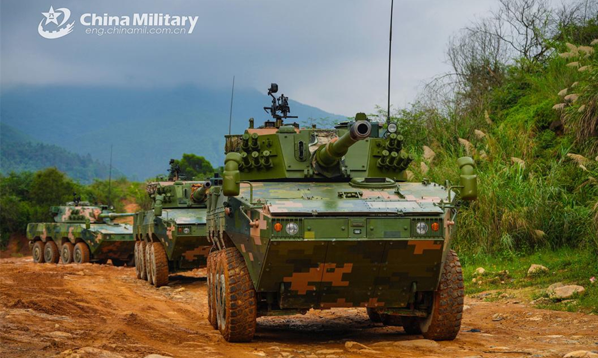 An infantry fighting vehicle (IFV) attached to a brigade under the PLA 73rd Group Army fires at simulated targets during a real-combat training exercise on June 26, 2024. (Photo: China Military Online )