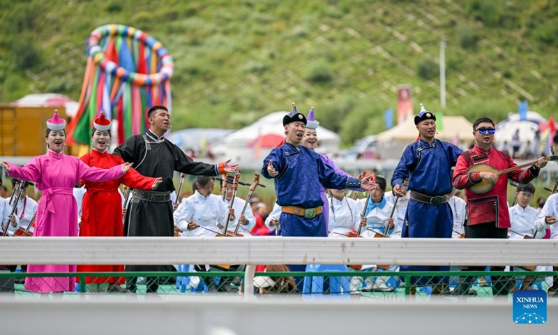 A performance is staged at the opening ceremony of a Nadam fair in Horqin Right Wing Front Banner, Hinggan League, north China's Inner Mongolia Autonomous Region, Aug. 8, 2024. A Nadam fair kicked off here on Thursday. Sport activities and a music festival will be held during the five-day event. (Photo: Xinhua)