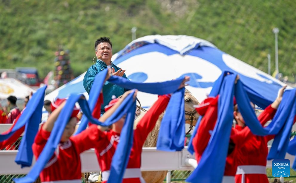 A performance is staged at the opening ceremony of a Nadam fair in Horqin Right Wing Front Banner, Hinggan League, north China's Inner Mongolia Autonomous Region, Aug. 8, 2024. A Nadam fair kicked off here on Thursday. Sport activities and a music festival will be held during the five-day event. (Photo: Xinhua)