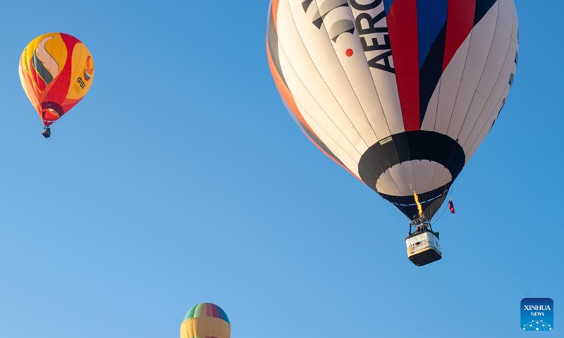 Hot-air balloons fly during the Sky of Russia hot-air balloon festival in Ryazan region, Russia, on Aug. 10, 2024. The 22nd ballooning festival Sky of Russia is held here from Aug. 4 to 12, and more than 30 teams are featured in the festival. Photo: Xinhua