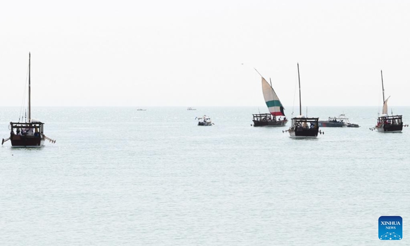 Dhow boats carrying divers are pictured during the inauguration of the 33rd Pearl Diving Festival at a dock in Al-Salmiya, Hawalli Governorate, Kuwait, Aug. 10, 2024. The 33rd Pearl Diving Festival kicked off here Saturday, with up to 150 young sailors and divers boarding several dhow boats to embark on a pearl-finding trip that lasts for 6 days. Photo: Xinhua
