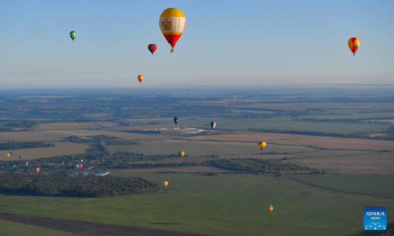 Hot-air balloons fly during the Sky of Russia hot-air balloon festival in Ryazan region, Russia, on Aug. 10, 2024. The 22nd ballooning festival Sky of Russia is held here from Aug. 4 to 12, and more than 30 teams are featured in the festival. Photo: Xinhua