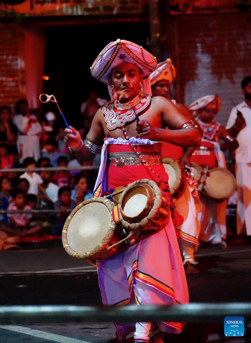 Dancers perform during a procession celebrating the Esala Perahera festival in Kandy, Sri Lanka, Aug. 10, 2024. The Esala Perahera, one of the grandest Buddhist festivals in Sri Lanka, is observed from Aug. 10 to 20 this year. Photo: Xinhua