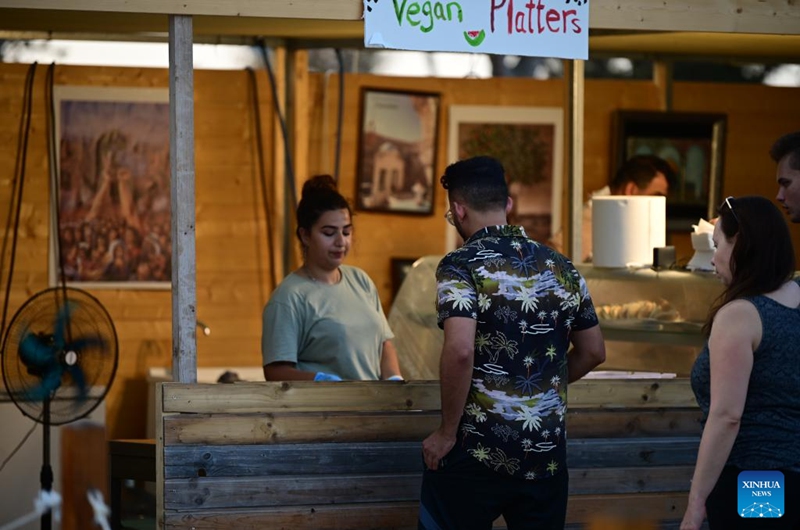 People visit the Malta International Food Festival in Floriana, Malta, on Aug. 11, 2024. Photo: Xinhua