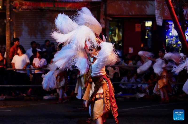 Dancers perform during a procession celebrating the Esala Perahera festival in Kandy, Sri Lanka, Aug. 10, 2024. The Esala Perahera, one of the grandest Buddhist festivals in Sri Lanka, is observed from Aug. 10 to 20 this year. Photo: Xinhua