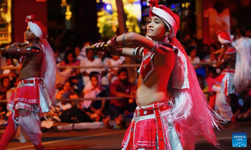 Dancers perform during a procession celebrating the Esala Perahera festival in Kandy, Sri Lanka, Aug. 10, 2024. The Esala Perahera, one of the grandest Buddhist festivals in Sri Lanka, is observed from Aug. 10 to 20 this year. Photo: Xinhua