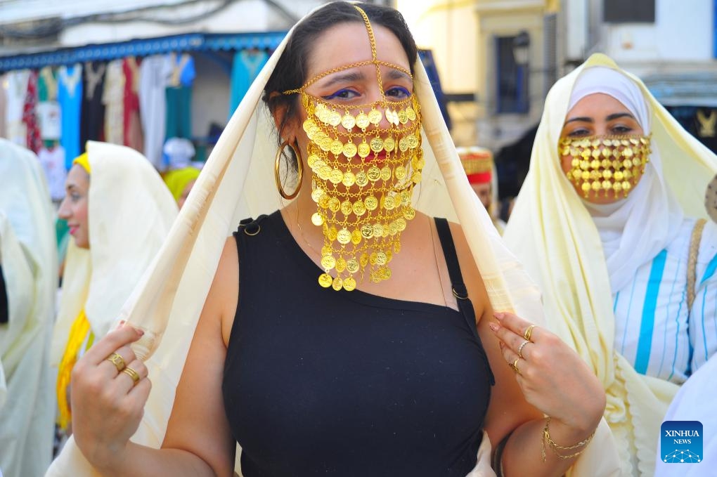 Women in Tunisian folk costumes attend a celebration of the annual National Women's Day in Tunis, Tunisia, on Aug. 13, 2024. (Photo: Xinhua)