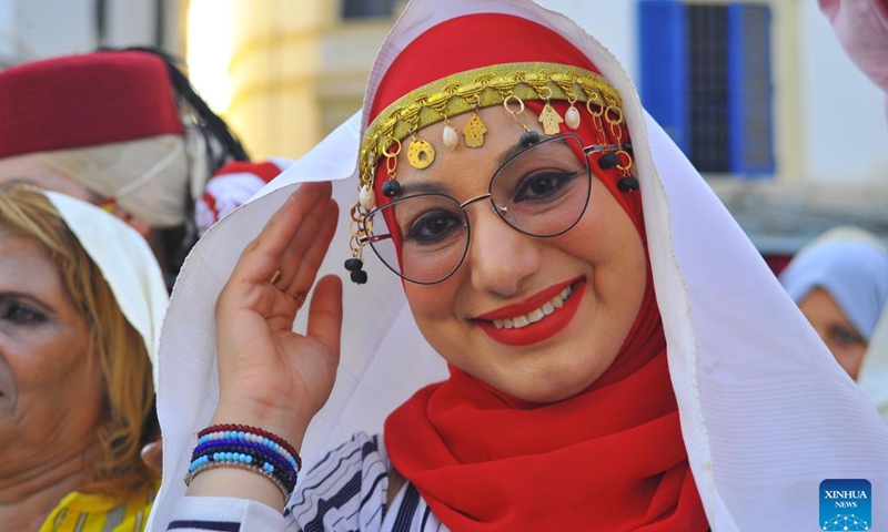 A woman in Tunisian folk costumes attends a celebration of the annual National Women's Day in Tunis, Tunisia, on Aug. 13, 2024. (Photo: Xinhua)