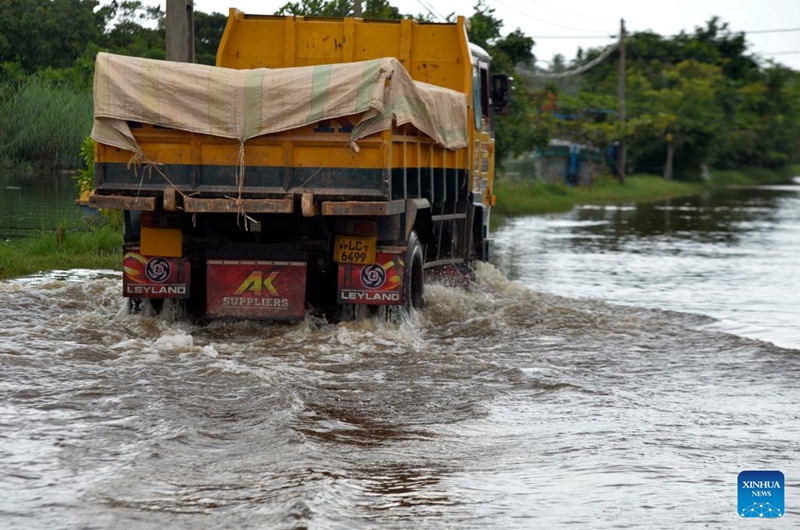 A truck rides on a waterlogged road in Wattala, Sri Lanka, on Aug. 18, 2024. Photo: Xinhua