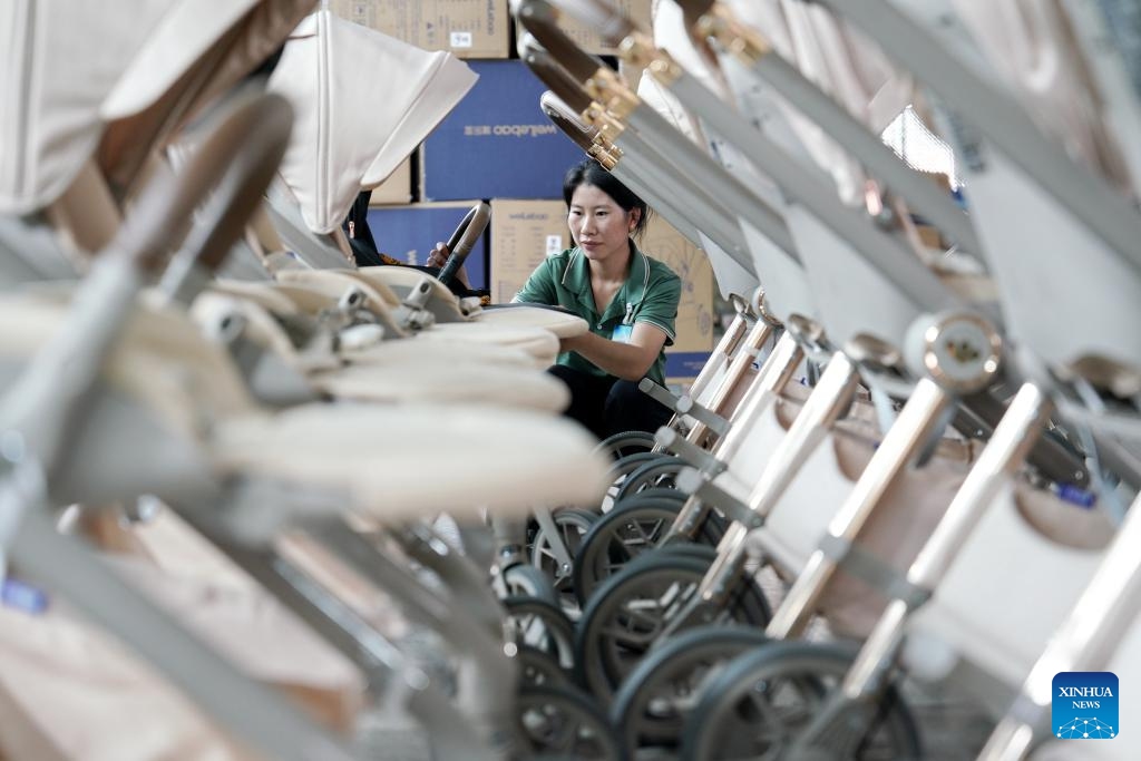 A worker is seen at a children wheels factory in Pingxiang County, north China's Hebei Province, Aug. 19, 2024. Pingxiang, dubbed the city of children wheels, has made great efforts in boosting its children wheels business in recent years. Products here have been sold to over 60 countries and regions including Russia, Britain, Kazakhstan and Thailand. The annual revenue of children wheels-related companies in the county has amounted to 30 billion yuan (about 4.20 billion U.S. dollars). (Photo: Xinhua)