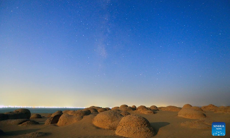 This long exposure photo taken on Aug. 23, 2024 shows the starry sky over the desert in Watermelon Valley of Fayoum, Egypt. (Xinhua/Sui Xiankai)