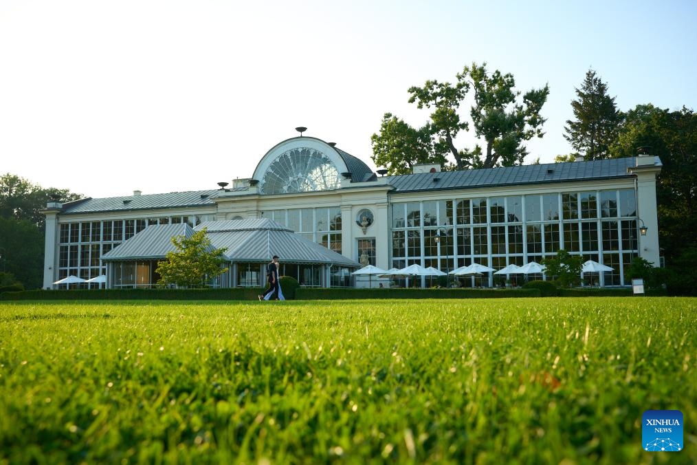People walk at the Royal Lazienki Park in Warsaw, Poland, on Aug. 29, 2024. After a month of repairing some facilities damaged by a thunderstorm in late July, the park has recently reopened to the public. (Photo: Xinhua)