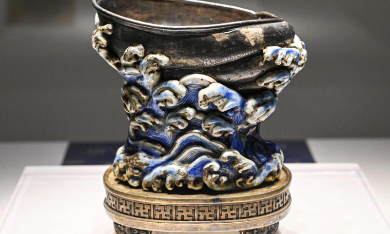 This photo taken on Aug. 31, 2024 shows an exhibit of Qing Dynasty (1644-1911) at Hainan Museum in Haikou, south China's Hainan Province. An ongoing exhibition showcasing Hainan's cultural relics collected by the Palace Museum is held at Hainan Museum. A total of 96 exhibits with Hainan characteristics are on display including traditional furniture, ornaments and stationery, etc. (Xinhua/Pu Xiaoxu)