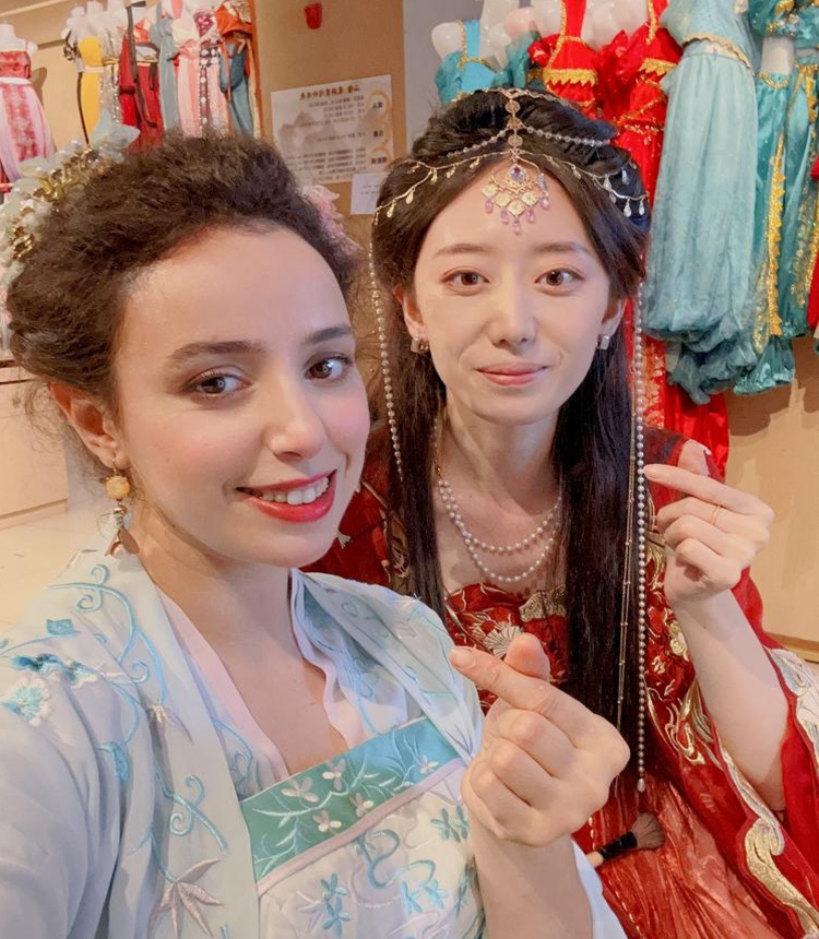 This undated file photo shows El Batoul Nejjaoui (L) and her friend wearing traditional Chinese costumes. (Xinhua)