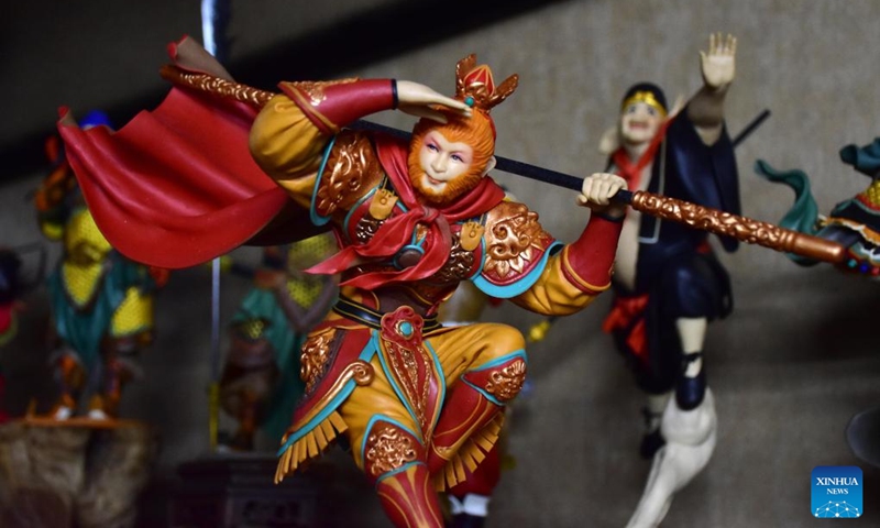 Dough sculpture works by Song Zhanke are pictured at his studio in Luoyang, central China's Henan Province, Aug. 27, 2024. The dough handicraft takes wheat and glutinous rice flour as its main building materials, which are mixed with oil, salt, vinegar and other ingredients. Using hands and simple tools, an artist kneads and pinches the dough to turn it into intricate and lifelike figures.
Song Zhanke, 46, is an inheritor of Song's dough sculpture, a renowned dough handicraft in Luoyang. Having lived by the profession for 20 plus years, the inheritor believes that the figure's body-head proportion, gestures, and facial expressions hold the key to this craft. It is not only the practice of a skill, but also a pursuit and perception of beauty, Song said.
Song hopes that the craft will be better received among younger people and passed down to the future generations. Photo: Xinhua