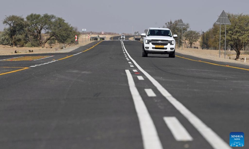 A vehicle runs on the B1 highway in Tses, Kharas region, Namibia, on Sept. 3, 2024. A ceremony was held Tuesday in Namibia's southern town of Tses to celebrate the commissioning of the B1 highway, the country's key transportation route, after its rehabilitation project is finished. (Photo: Xinhua)