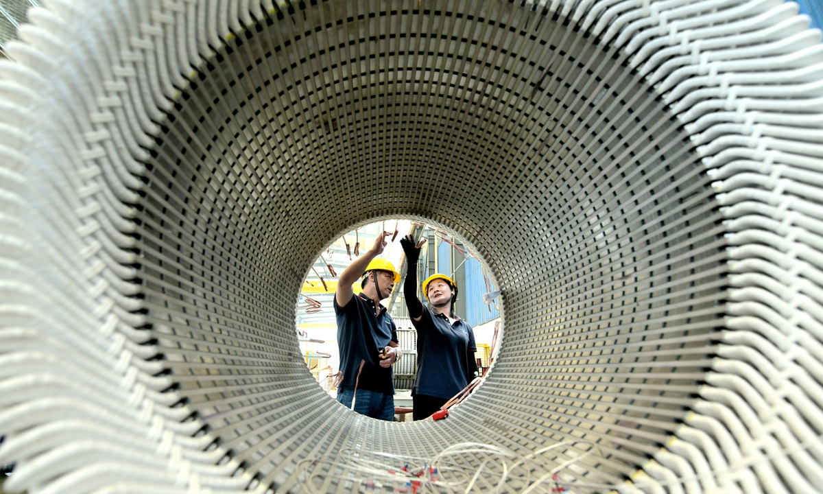 

Employees work at an electrical machinery factory in Haian, Nantong, East China's Jiangsu Province on September 5, 2024. The local government of Haian has actively guided local enterprises to explore overseas markets with more high-quality products. Photo: cnsphoto